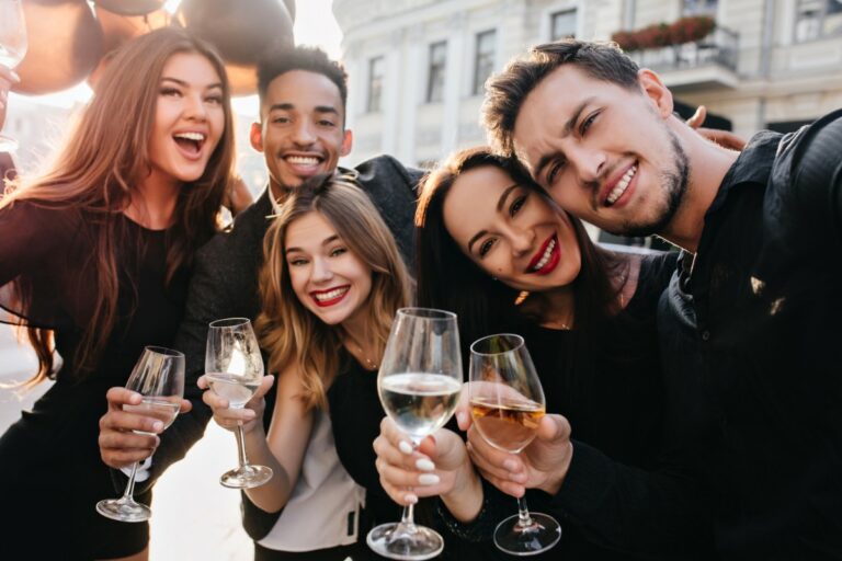 friends-having-fun-drinking-champagne-outdoors (1)